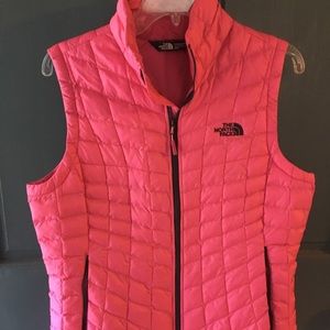 Bright pink North Face vest